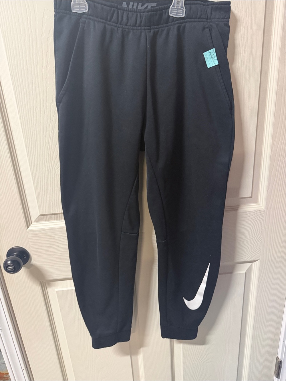 Nike Black men’s Jogger Sweatpants with White Swoosh